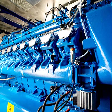 Blue diesel and gas engine powering a CHP Power System