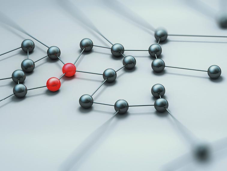 A network of metallic spheres connected by rods, with two red spheres in the center standing out among the grey spheres.