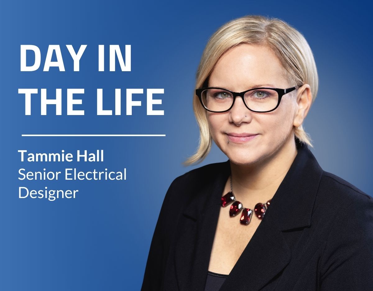 Blue graphic featuring a professional headshot on the right of a person wearing glasses, a black blazer, and a red statement necklace against a blue background. On the left side, large white text reads “DAY IN THE LIFE,” with smaller text below reading “Tammie Hall, Senior Electrical Designer.”