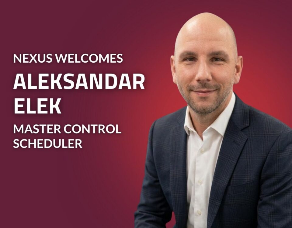 Graphic announcing a new hire at Nexus Engineering Group. The image features a professional headshot of a person in a dark blazer and white dress shirt against a red gradient background. White text on the left reads: “Nexus Welcomes Aleksandar Elek, Master Control Scheduler.” The Nexus branding colors are used throughout the graphic.